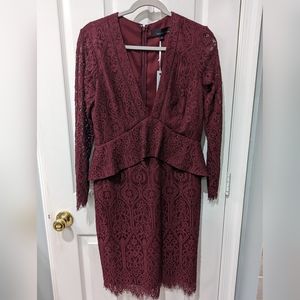 Red lace dress with peplum and deep neckline